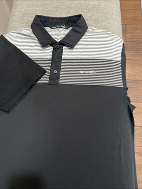 Travis Mathew Black Polo with White & Gray Striped Chest Panel